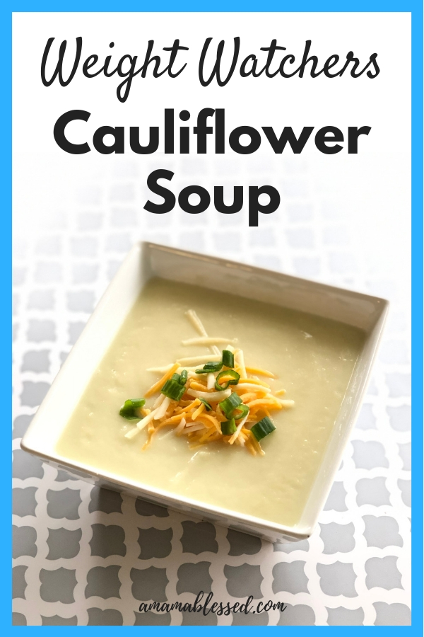 Weight Watchers Cauliflower Soup in a white bowl sitting upon a checkered background.
