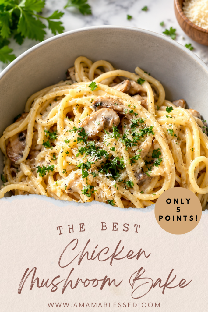 Mushroom chicken baked topped with fresh herbs sits in a medium sized gray bowl.