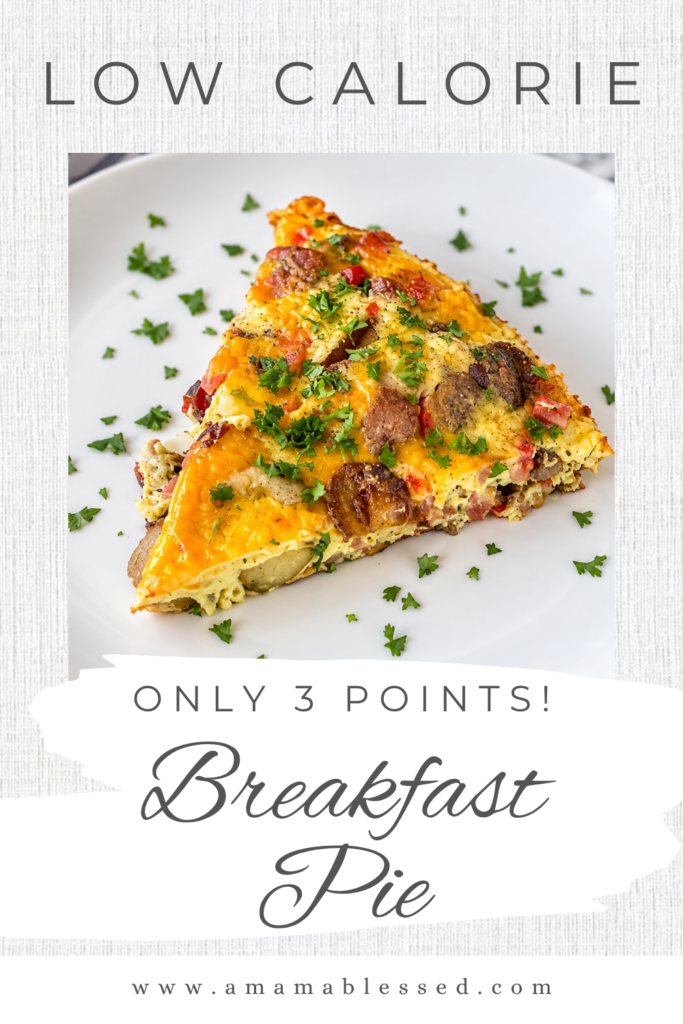 A slice of easy ham and potato breakfast bake sits on top of a white plate. 