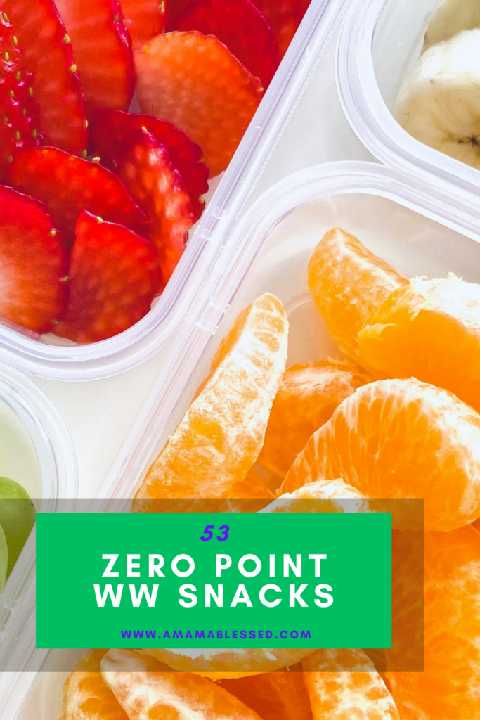 A close up of oranges, strawberries, grapes, and bananas in a snack container. 