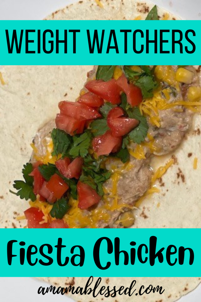 Weight Watchers Fiesta Chicken on a tortilla with cheese, tomatoes, and cilantro